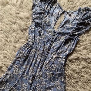 A.E. FLUTTER SLEEVE CULOTTE JUMPSUIT